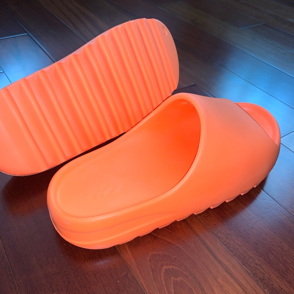 (ON HOLD DO NOT BUY) ENFLAME ORANGE YEEZY SLIDES